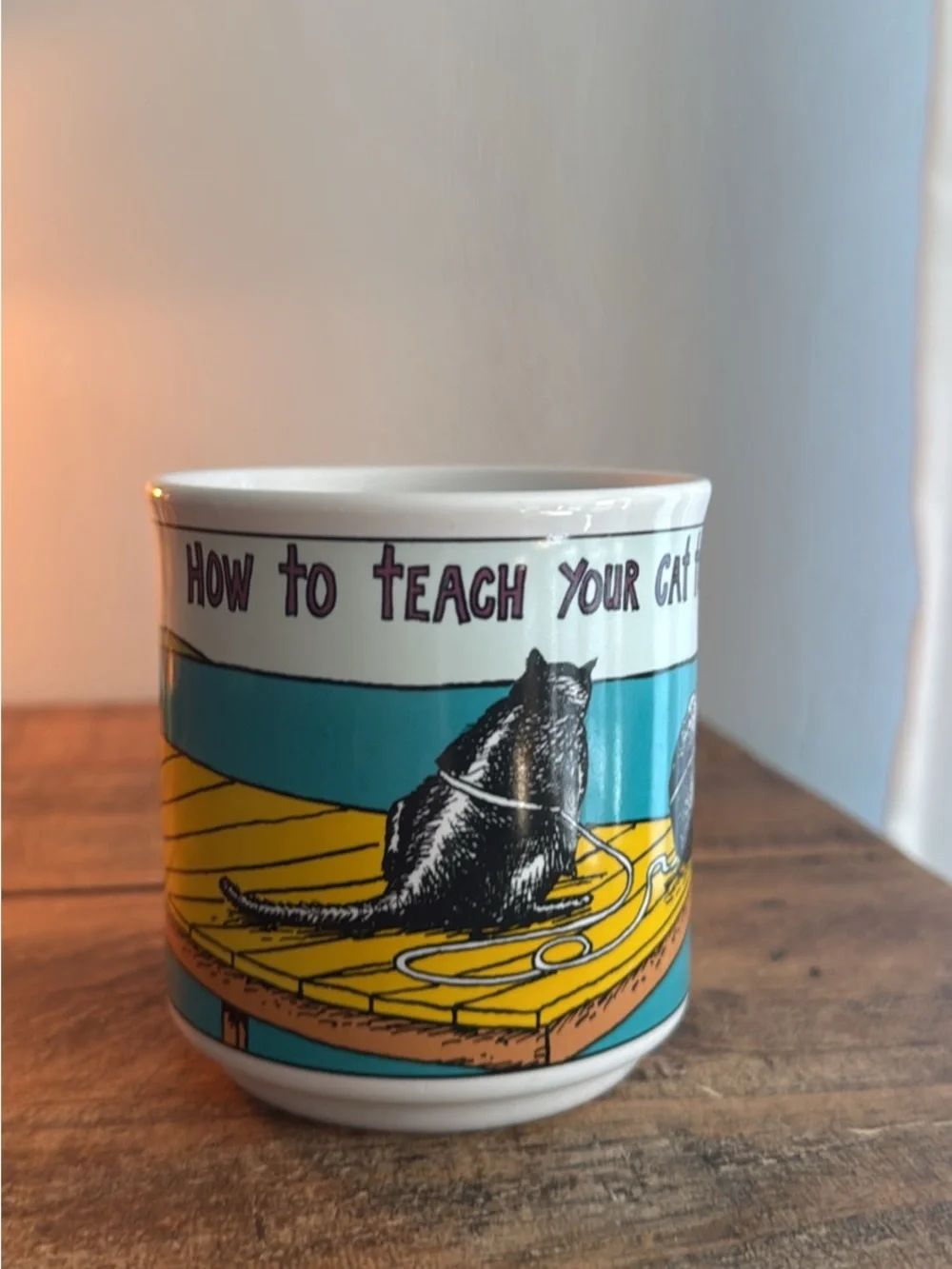 Vintage Ceramic Cat-Themed Coffee Mug in Teal and Yellow made by Recycled Paper